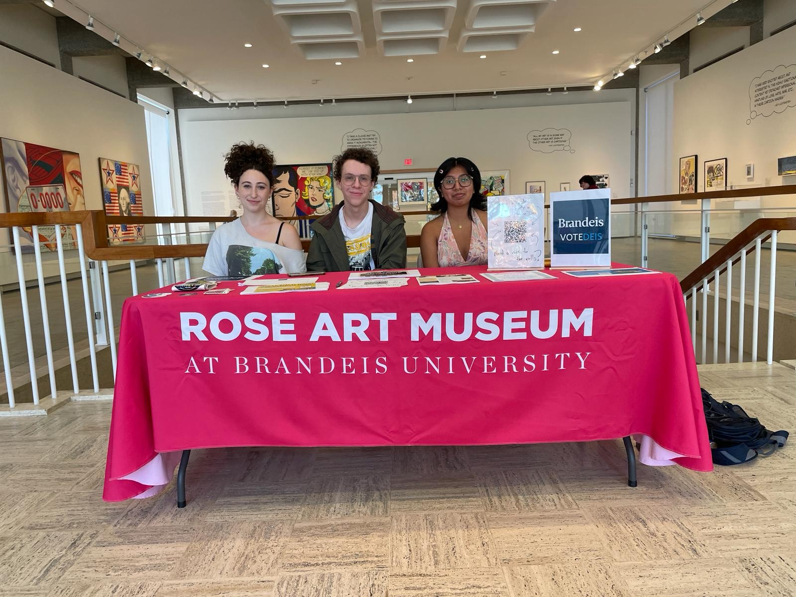 Table of students supporting voting efforts at the Rose Art Museum tour